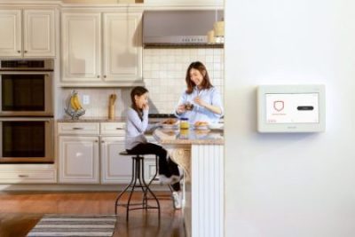 Image of mother and daughter in a home with Protection Systems, Inc. residential burglar alarm systems